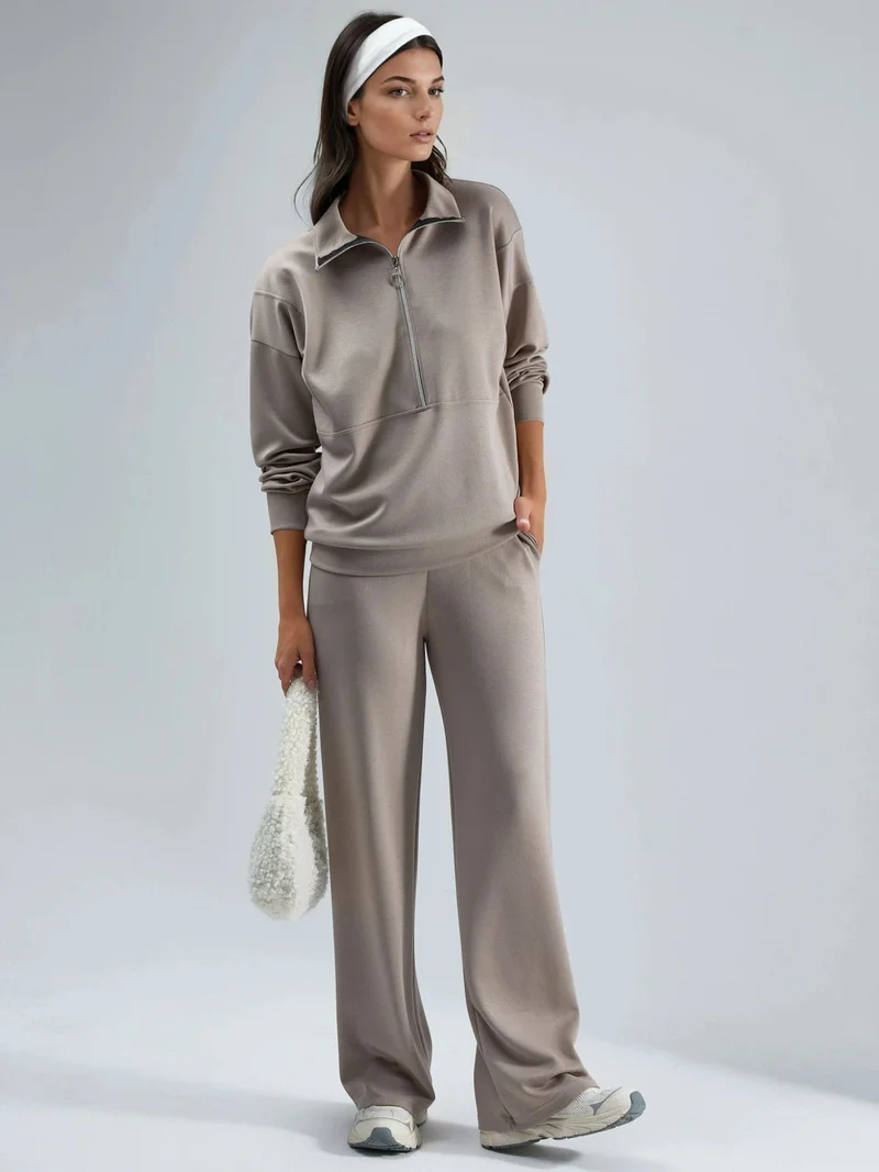 هيكاب طقم نسائي واسع الساق بياقة بسحاب من مجموعة بيرسان